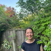 Photo of Deborah in her garden.