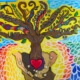 Brightly colored mural of a tree with branches as support, community, love, and unity. The tree roots are held by hands.