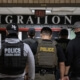 ICE agents in the halls of 26 Federal Plaza, NYC, June 2025.